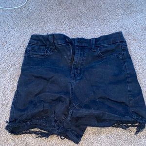 black jean shorts with rips